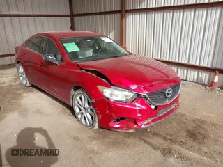 2016 Mazda Mazda6 i Touring with VIN JM1GJ1V58G1425881, listed as a IAAI auction lot 41786149 with 114,638 mi miles. Bid and sale history available at carsss.com. Image 1.