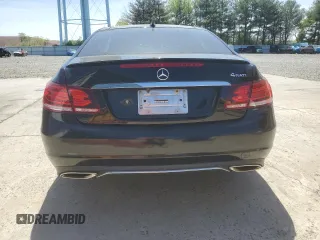 2015 Mercedes-Benz E 400 with VIN WDDKJ6HB2FF303744, listed as a Copart auction lot 55131245 with 84,714 mi miles and Salvage Title. Bid and sale history available at DreamBid. Image 6.