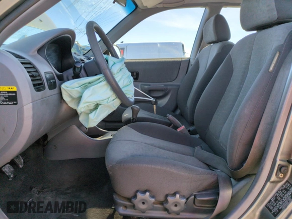 2004 Hyundai Accent GL with VIN KMHCG45C94U523529, listed as a Copart auction lot 50016085 with 188,120 mi miles and Salvage Title. Bid and sale history available at carsss.com. Image 7.