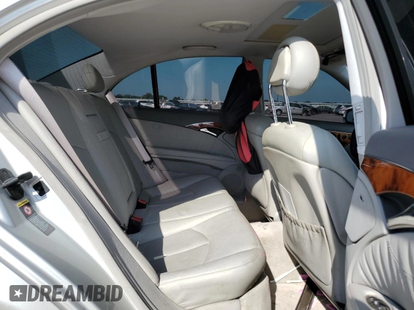 2004 Mercedes-Benz E-Class 5.0L with VIN WDBUF70J84A492244, listed as a Copart auction lot 61143664 with 165,750 mi miles and Salvage Title. Bid and sale history available at carsss.com. Image 10.