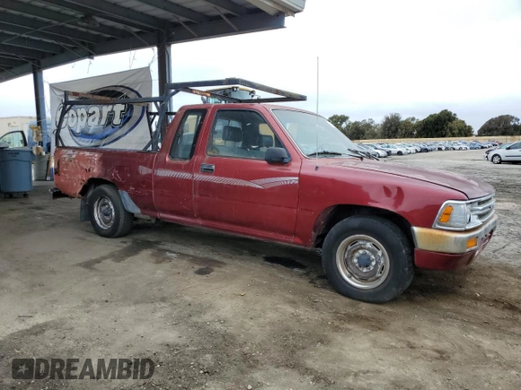 1991 Toyota Pickup DLX с VIN JT4RN93P9M5040575, выставлен на аукционе Copart как лот 58934495 с пробегом 43 376 миль миль и Списание • Salvage title. История ставок и продаж доступна на DreamBid. Изображение 4.