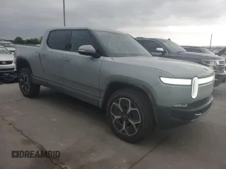 2022 Rivian R1T Adventure z VIN 7FCTGAAA0NN014488, wystawiony jako Copart lot #51024514 z przebiegiem 18 721 mil mil oraz Szkody całkowita. Historia ofert i sprzedaży dostępna na DreamBid. Obrazek 4.