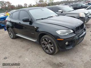 2014 BMW X6 50i with VIN 5UXFG8C54EL593152, listed as a IAAI auction lot 41439576 with 147,817 mi miles. Bid and sale history available at carsss.com. Image 1.