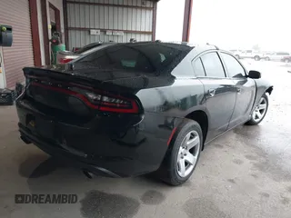 2021 Dodge Charger Police with VIN 2C3CDXAT5MH663136, listed as a IAAI auction lot 40348927 with 66,501 mi miles and . Bid and sale history available at DreamBid. Image 4.