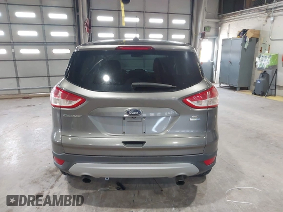 2014 Ford Escape SE with VIN 1FMCU9G99EUC45854, listed as a IAAI auction lot 41986959 with 124,591 mi miles. Bid and sale history available at carsss.com. Image 16.