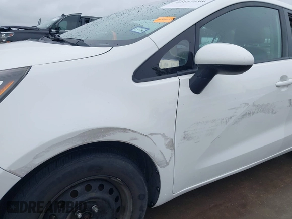2017 Kia Rio LX z VIN KNADM4A37H6005689, wystawiony jako IAAI lot #42117199 z przebiegiem 117 184 mil mil oraz . Historia ofert i sprzedaży dostępna na DreamBid. Obrazek 19.