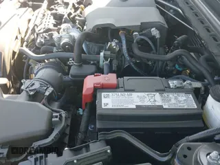 2024 Toyota Camry SE z VIN 4T1G11AK1RU899809, wystawiony jako IAAI lot #43160084 z przebiegiem 44 725 mil mil oraz . Historia ofert i sprzedaży dostępna na DreamBid. Obrazek 20.