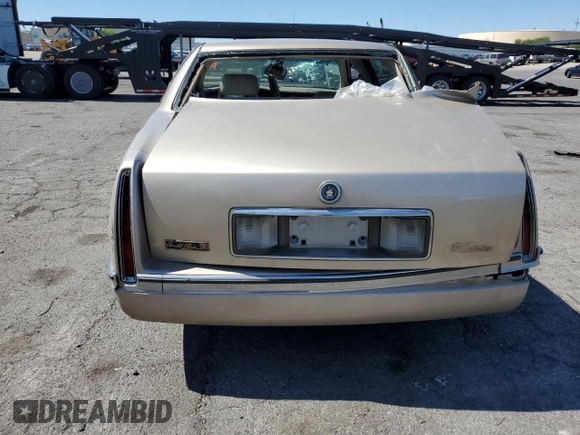 1995 Cadillac DeVille z VIN 1G6KD52B6SU274827, wystawiony jako Copart lot #41902125 z przebiegiem Nie podano mil oraz Szkoda całkowita • Salvage title. Historia ofert i sprzedaży dostępna na DreamBid. Obrazek 6.