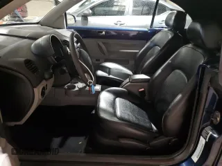 2003 Volkswagen Beetle GLS with VIN 3VWCK21Y03M310235, listed as a Copart auction lot 56853935 with 93,424 mi miles and Clean Title. Bid and sale history available at DreamBid. Image 7.