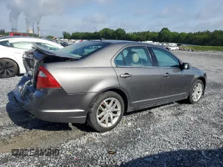 2012 Ford Fusion SEL with VIN 3FAHP0JA7CR387288, listed as a Copart auction lot 56968885 with 169,802 mi miles and Salvage title. Bid and sale history available at DreamBid. Image 3.