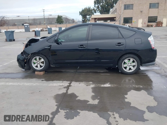 2006 Toyota Prius with VIN JTDKB20U063181951, listed as a IAAI auction lot 41573550 with 158,970 mi miles. Bid and sale history available at carsss.com. Image 14.