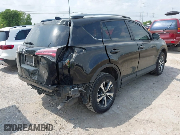 2018 Toyota RAV4 XLE z VIN 2T3WFREV4JW495379, wystawiony jako IAAI lot #42406849 z przebiegiem 132 126 mil mil oraz . Historia ofert i sprzedaży dostępna na DreamBid. Obrazek 4.