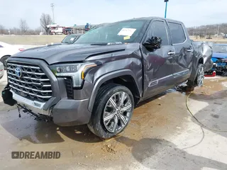 2022 Toyota Tundra Capstone Hybrid with VIN 5TFVC5DB6NX005465, listed as a IAAI auction lot 41589222 with 28,452 mi miles and . Bid and sale history available at DreamBid. Image 2.