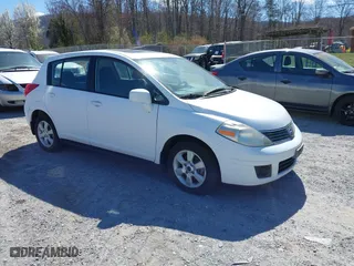 2009 Nissan Versa 1.8 SL with VIN 3N1BC13E19L404019, listed as a IAAI auction lot 41872871 with 192,158 mi miles. Bid and sale history available at carsss.com. Image 1.