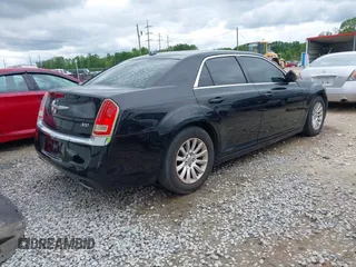 2013 Chrysler 300 with VIN 2C3CCAAG8DH515050, listed as a IAAI auction lot 41905134 with 137,837 mi miles. Bid and sale history available at carsss.com. Image 4.