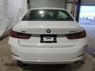 2025 BMW 3 Series 330i xDrive with VIN 3MW89CW02S8F00975, listed as a Copart auction lot 89027935 with 3,667 mi miles and Salvage Title. Bid and sale history available at carsss.com. Image 6.