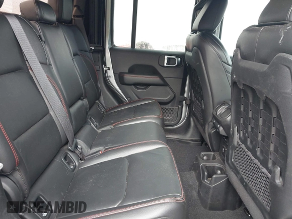 2020 Jeep Gladiator Rubicon z VIN 1C6JJTBG7LL181833, wystawiony jako IAAI lot #42493073 z przebiegiem 13 775 mil mil oraz . Historia ofert i sprzedaży dostępna na DreamBid. Obrazek 8.