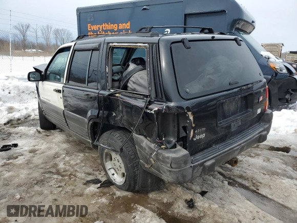 1998 Jeep Grand Cherokee Laredo with VIN 1J4GZ58SXWC293835, listed as a Copart auction lot 47557855 with 217,948 mi miles and Salvage Title. Bid and sale history available at carsss.com. Image 2.