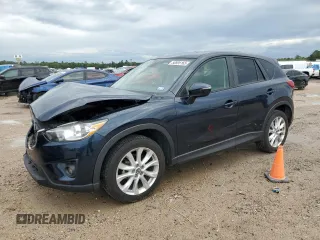 2015 Mazda CX-5 Grand Touring with VIN JM3KE2DY1F0466011, listed as a Copart auction lot 50695165 with 51,967 mi miles and Salvage Title. Bid and sale history available at carsss.com. Image 1.