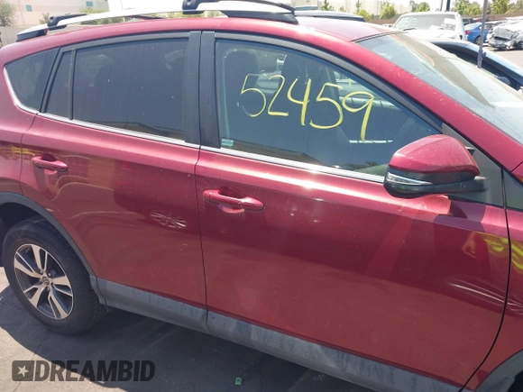 2018 Toyota RAV4 XLE with VIN 2T3WFREV4JW505053, listed as a IAAI auction lot 42552459 with 94,552 mi miles and . Bid and sale history available at DreamBid. Image 14.