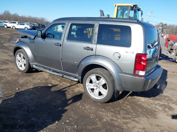 2011 Dodge Nitro Heat with VIN 1D4PU4GX9BW607188, listed as a IAAI auction lot 41100616 with 86,062 mi miles. Bid and sale history available at carsss.com. Image 3.