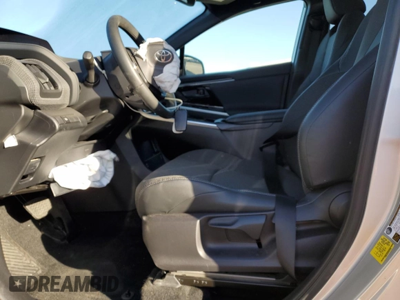 2023 Toyota bZ4X XLE with VIN JTMAAAAA8PA015784, listed as a Copart auction lot 56072755 with 21,387 mi miles and Salvage Title. Bid and sale history available at DreamBid. Image 7.