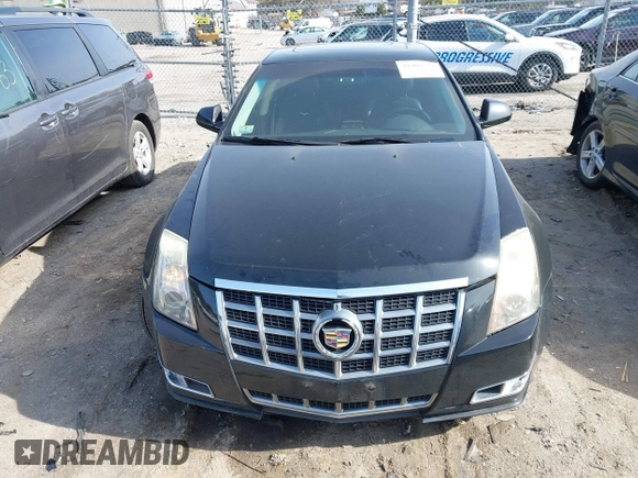 2012 Cadillac CTS with VIN 1G6DM5E39C0106931, listed as a IAAI auction lot 41909732 with 213,319 mi miles and . Bid and sale history available at DreamBid. Image 12.