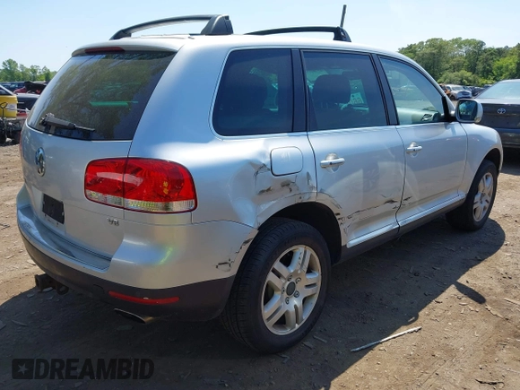 2005 Volkswagen Touareg 4.2L V8 z VIN WVGZM77L15D080697, wystawiony jako IAAI lot #42399779 z przebiegiem 138 040 mil mil oraz . Historia ofert i sprzedaży dostępna na DreamBid. Obrazek 4.