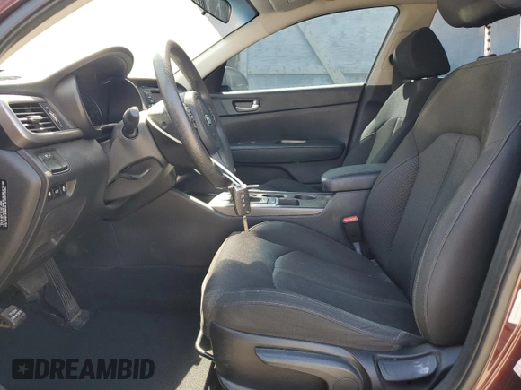 2016 Kia Optima LX with VIN 5XXGT4L34GG060276, listed as a Copart auction lot 65426975 with 129,029 mi miles and Salvage title. Bid and sale history available at DreamBid. Image 7.