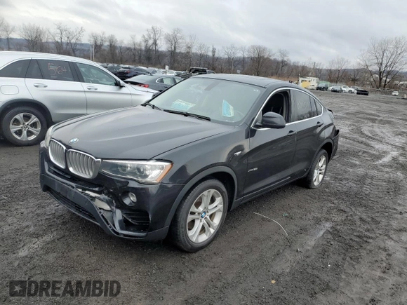 2015 BMW X4 xDrive28i with VIN 5UXXW3C54F0M89256, listed as a Copart auction lot 41388973 with 136,359 mi miles. Bid and sale history available at carsss.com. Image 1.