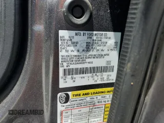 2013 Ford Expedition Limited z VIN 1FMJU2A50DEF11632, wystawiony jako Copart lot #55976345 z przebiegiem 176 168 mil mil oraz Szkoda całkowita • Salvage title. Historia ofert i sprzedaży dostępna na DreamBid. Obrazek 13.