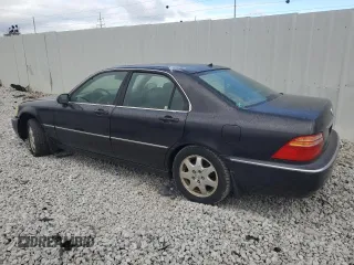 2002 Acura RL with VIN JH4KA96502C004028, listed as a Copart auction lot 74913914 with 220,819 mi miles and Salvage Title. Bid and sale history available at carsss.com. Image 2.