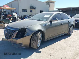2010 Cadillac CTS Luxury with VIN 1G6DE5EG6A0107337, listed as a IAAI auction lot 40464109 with 181,609 mi miles and . Bid and sale history available at carsss.com. Image 18.