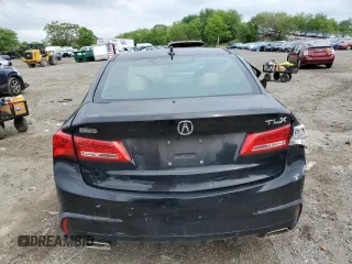 2018 Acura TLX z VIN 19UUB2F34JA005529, wystawiony jako Copart lot #54868315 z przebiegiem Nie podano mil oraz Szkoda całkowita • Salvage title. Historia ofert i sprzedaży dostępna na DreamBid. Obrazek 6.