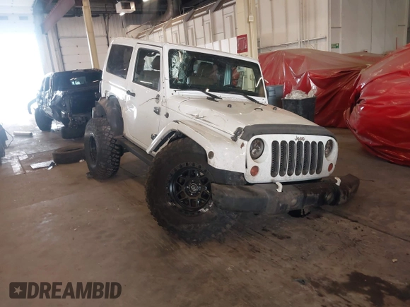 2012 Jeep Wrangler Arctic z VIN 1C4AJWBG9CL233232, wystawiony jako IAAI lot #42282805 z przebiegiem 109 927 mil mil oraz . Historia ofert i sprzedaży dostępna na DreamBid. Obrazek 1.