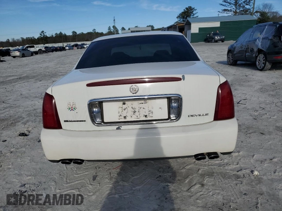 2001 Cadillac DeVille z VIN 1G6KD54Y61U227040, wystawiony jako Copart lot #46423295 z przebiegiem 180 289 mil mil oraz Szkoda całkowita • Salvage title. Historia ofert i sprzedaży dostępna na DreamBid. Obrazek 6.