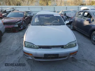 1995 Toyota Camry LE with VIN 4T1GK12E5SU76389, listed as a Copart auction lot 83120474 with 245,875 mi miles and Non Repairable. Bid and sale history available at carsss.com. Image 5.