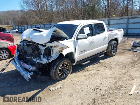 2022 Toyota Tacoma SR with VIN 3TMCZ5AN4NM470000, listed as a IAAI auction lot 41629818 with 78,138 mi miles and . Bid and sale history available at DreamBid. Image 2.