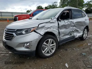 2020 Chevrolet Equinox Premier z VIN 3GNAXYEX0LS626253, wystawiony jako Copart lot #56818785 z przebiegiem 64 006 mil mil oraz Szkoda całkowita • Salvage title. Historia ofert i sprzedaży dostępna na DreamBid. Obrazek 1.