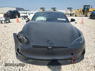 2023 Tesla Model S Plaid z VIN 5YJSA1E61PF528022, wystawiony jako Copart lot #53088135 z przebiegiem Nie podano mil oraz Czysty tytuł • Clean title. Historia ofert i sprzedaży dostępna na DreamBid. Obrazek 5.