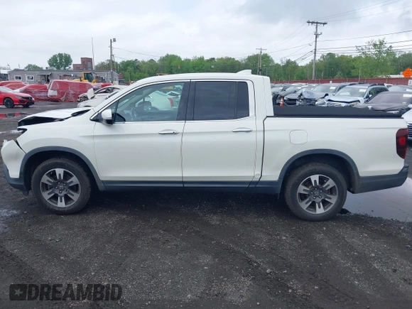 2019 Honda Ridgeline RTL-E with VIN 5FPYK3F75KB020713, listed as a IAAI auction lot 42191152 with 31,245 mi miles and . Bid and sale history available at DreamBid. Image 14.