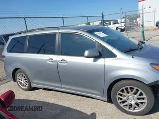 2011 Toyota Sienna SE with VIN 5TDXK3DC8BS131434, listed as a IAAI auction lot 42002675 with 209,396 mi miles. Bid and sale history available at carsss.com. Image 14.