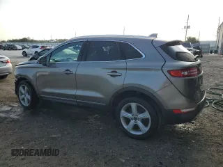 2017 Lincoln MKC Premiere z VIN 5LMCJ1C95HUL16078, wystawiony jako Copart lot #55853005 z przebiegiem 114 821 mil mil oraz Szkoda całkowita • Salvage title. Historia ofert i sprzedaży dostępna na DreamBid. Obrazek 2.