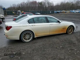 2014 BMW 7 Series ALPINA B7 xDrive with VIN WBAYF8C5XED142604, listed as a Copart auction lot 52551345 with 124,474 mi miles and Clean Title. Bid and sale history available at DreamBid. Image 3.