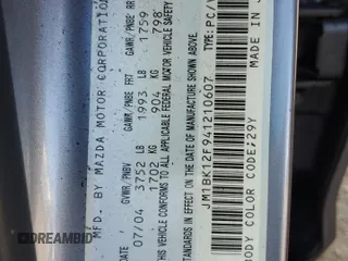 2004 Mazda 3 i with VIN JM1BK12F941210607, listed as a Copart auction lot 49387525 with 97,506 mi miles and Salvage Title. Bid and sale history available at DreamBid. Image 13.