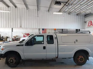 2011 Ford Super Duty F-250 SRW XL with VIN 1FT7X2B64BEB82069, listed as a IAAI auction lot 41818418 with 333,546 mi miles. Bid and sale history available at carsss.com. Image 14.