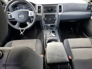 2010 Jeep Grand Cherokee Laredo with VIN 1J4PS4GK7AC117852, listed as a Copart auction lot 89107185 with 167,357 mi miles and Salvage Title. Bid and sale history available at carsss.com. Image 8.