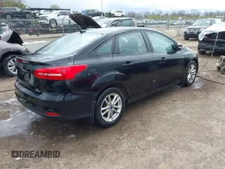 2016 Ford Focus SE with VIN 1FADP3F26GL280805, listed as a IAAI auction lot 42031492 with 146,986 mi miles. Bid and sale history available at carsss.com. Image 4.