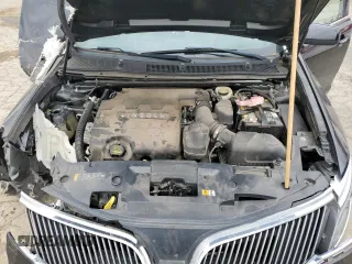 2013 Lincoln MKS z VIN 1LNHL9DKXDG612368, wystawiony jako Copart lot #48328215 z przebiegiem 108 788 mil mil oraz Szkoda całkowita • Salvage title. Historia ofert i sprzedaży dostępna na DreamBid. Obrazek 12.