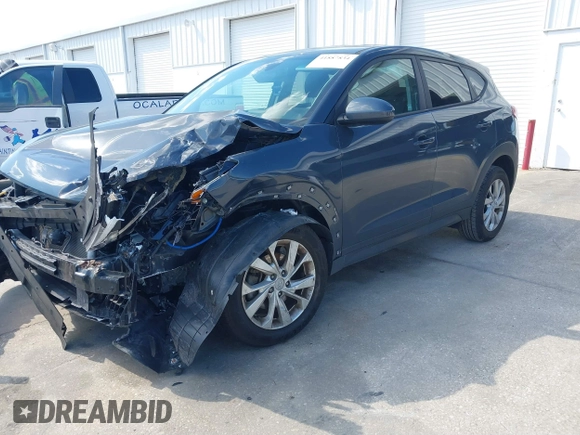 2021 Hyundai Tucson SE with VIN KM8J23A48MU379826, listed as a IAAI auction lot 41887834 with 51,885 mi miles and . Bid and sale history available at DreamBid. Image 2.